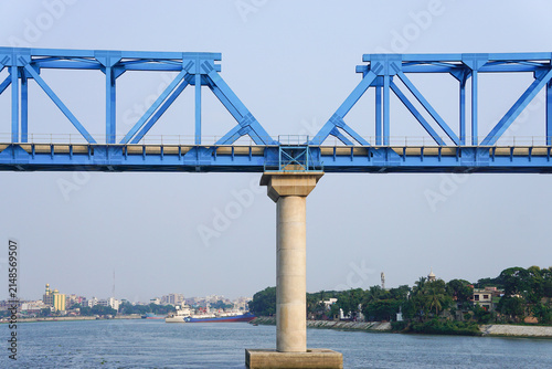 River Bridge Under Construction Supported by Blue Steel Trusses