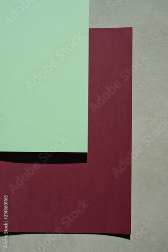 Colored paper, flat cardboard. Stacks of paper sheets of varying thicknesses and colors.