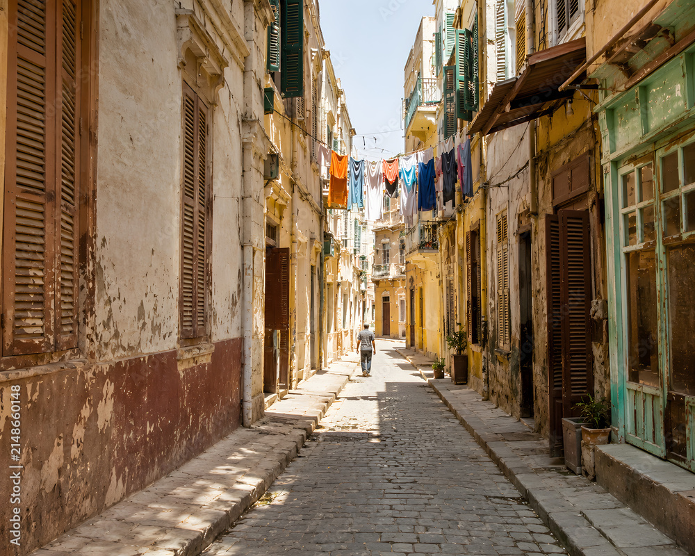 Fototapeta premium Narrow Alleyway In Historic Alexandria Old Town Egypt