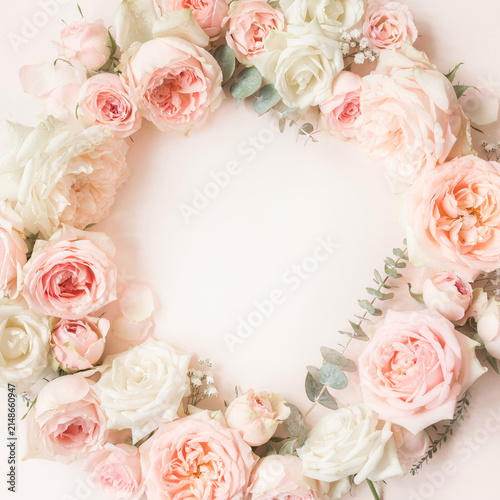 Elegant frame of soft pink and white roses with empty center