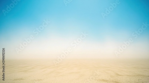 Expansive desert landscape under a vast, clear sky.