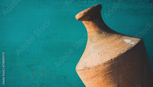 Ancient Clay Pot Submerged Under Turquoise Water Still Life.
