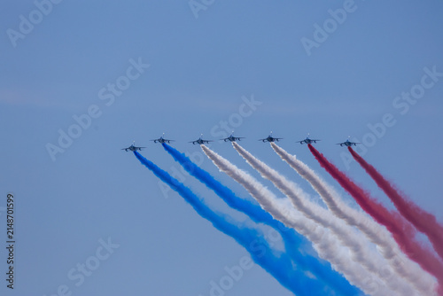 Jersey City, New Jersey, United States - 04 July 2026: View of jets performing an air show with red, white, and blue smoke trails over Liberty State Park.