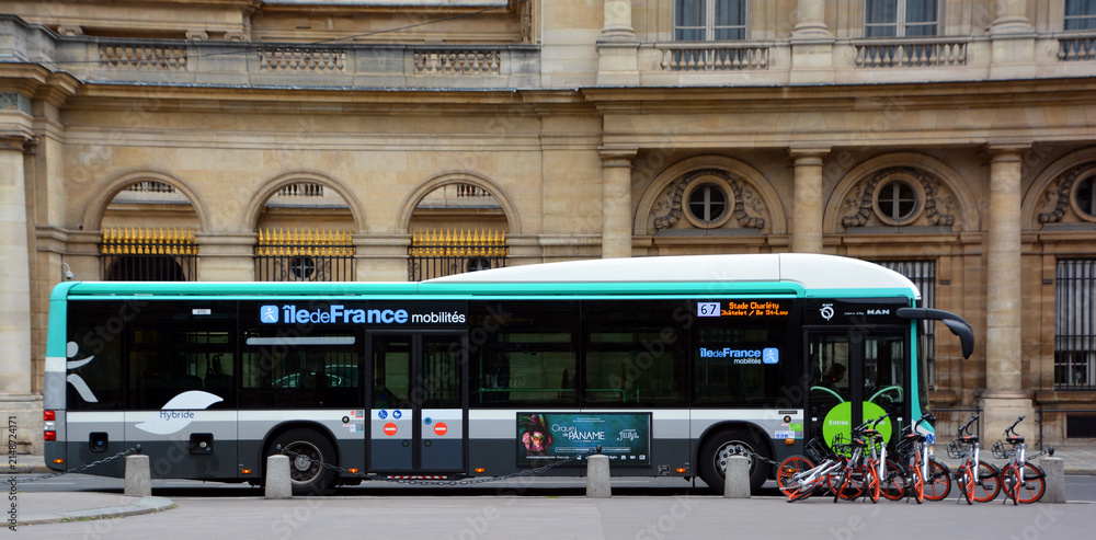 Obraz premium PARIS FRANCE: Public bus of Paris, Metro, RER train, tramway. The Paris public transport network serves the entire city and all its suburbs.