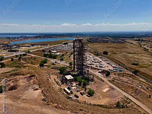 Aerial view of the historic Leyden coal mine tipple structure surrounded by a parking lot and dry landscape in Jefferson County, Colorado, United States.
