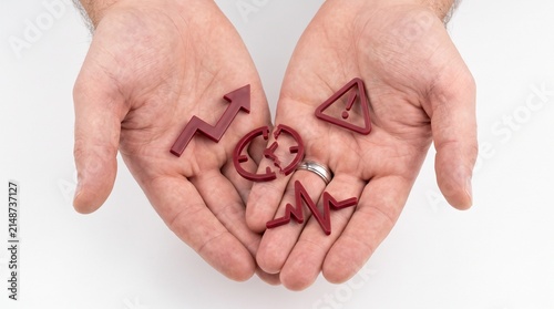 Hands holding business icons: upward trend, broken circle, warning sign and heartbeat graph. Icons symbolize business risk and growth analysis