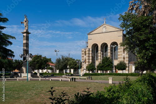 фотографія San Marco church, a building of the '30s in a fascist architectural style in Lat