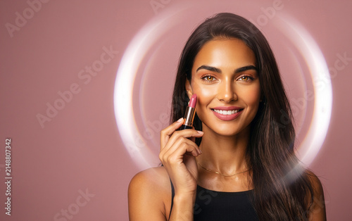 Smiling Woman Holding Lipstick with Ring Light