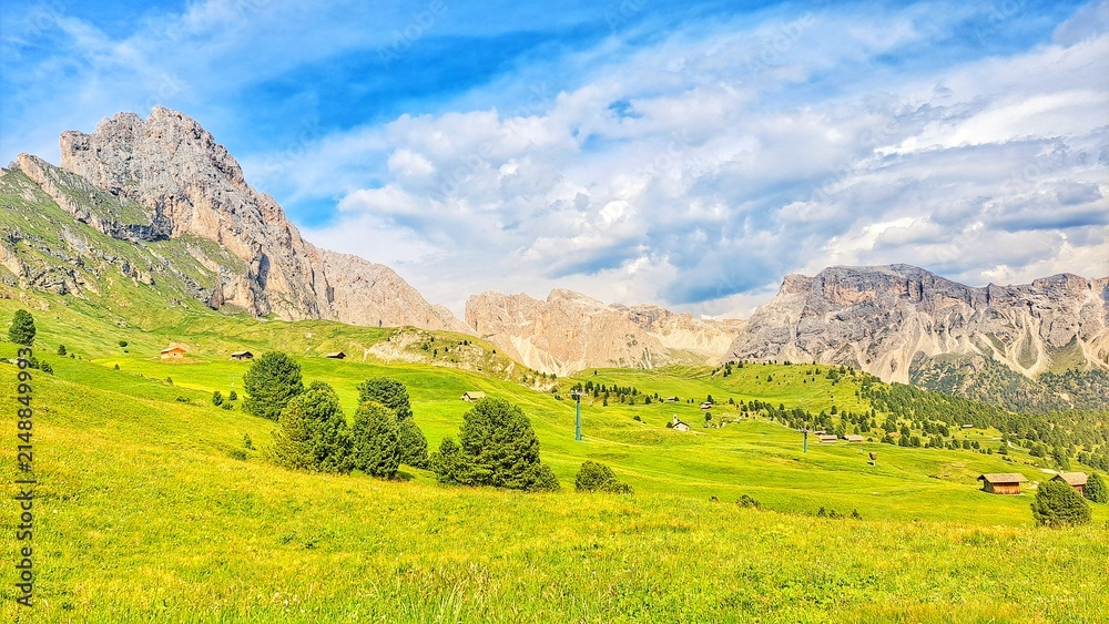 Obraz premium Panoramic View of Seceda Alpine Meadows and Dolomite Peaks, South Tyrol, Italy