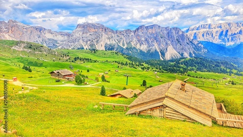 Bild auf Leinwand Seceda Ridge with Odle Peaks and Alpine Huts, Dolomites, South Tyrol, Italy
