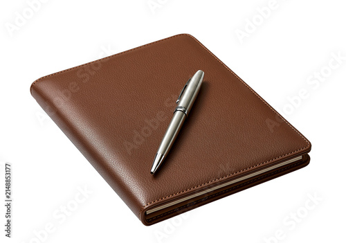 Elegant Brown Textured Leather Planner With A Shiny Silver Metal Pen Isolated On White Background