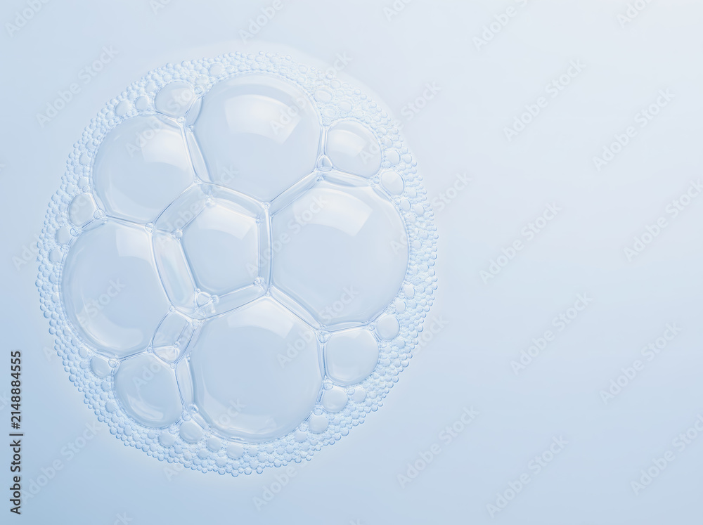 Naklejka premium Abstract soap foam bubbles texture on light blue background top view