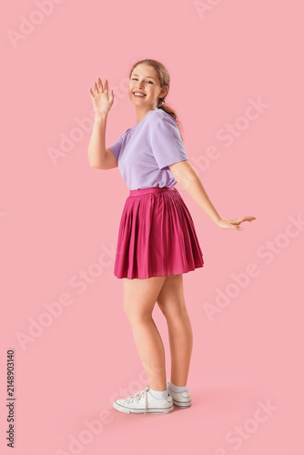 Smiling young redhead woman...