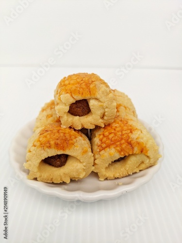 Cookies concept in selective focus. Traditional cookies for Eid festive called pineapple tart or tat nenas or known as nastar in Indonesia bite-size pastries filled or topped with pineapple jam.

