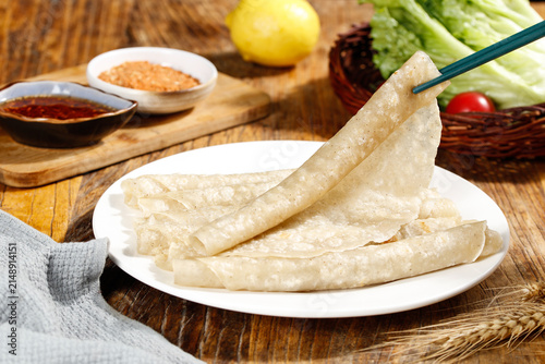 Buckwheat Pancakes with Fresh Vegetables and Sauces - Healthy Breakfast Meal on Wooden Table