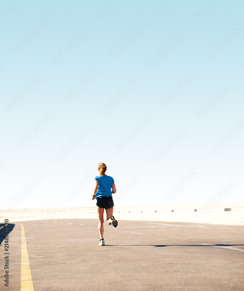 Obraz premium Cardio, woman or running for fitness on bridge with health training, morning exercise or vitality. Back, road or active runner with highway jog for wellness challenge, workout routine or mockup space