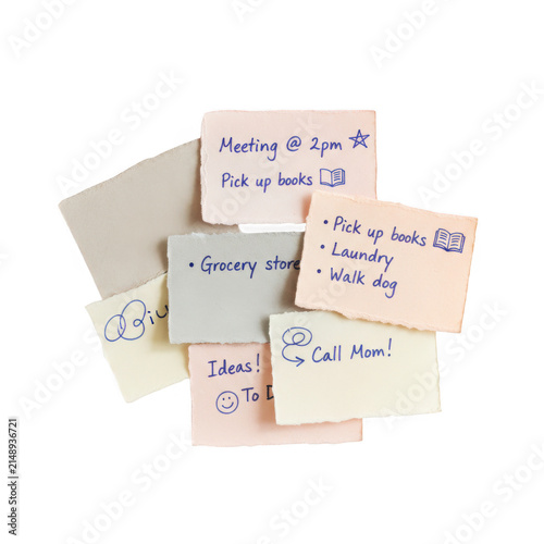 A stack of colorful sticky note papers with handwritten messages