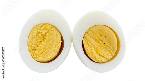 Quadro su tela Two halves of a hard-boiled egg showing white albumen and yellow yolk