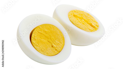 фотографія Two halves of a hard-boiled egg showing white albumen and yellow yolk