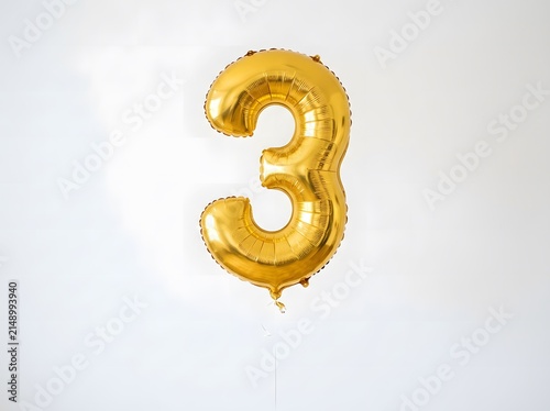 3. Foil balloon number three isolated on white background