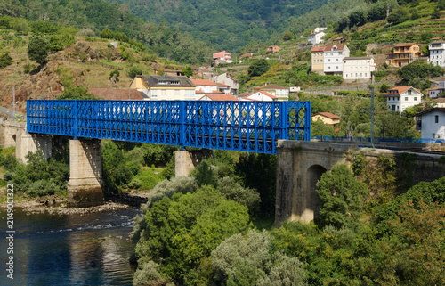 Bild auf Leinwand Summer view of depopulated Os Peares village in Galicia, Spain, representative o