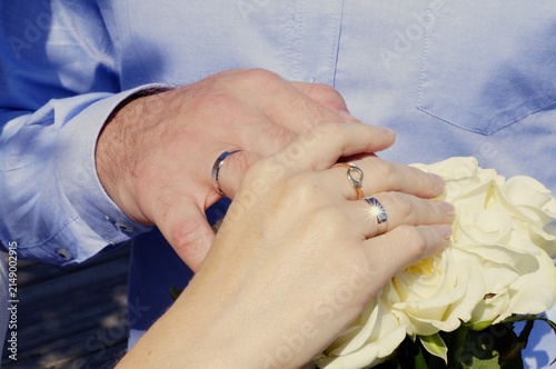 Canvastavla Bride and groom exchange wedding rings during a ceremony