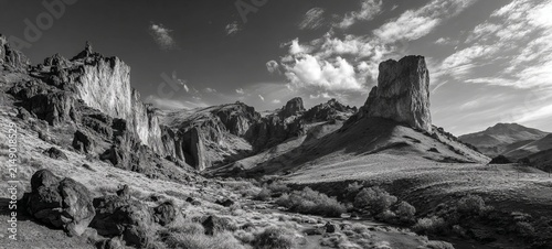 Monochrome Majesty - A Striking Landscape of Rock Formations and Sky.