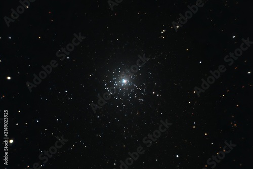 Glimpse into the Cosmos - A Dense Star Cluster Shines Brightly.