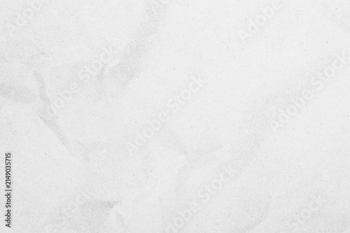 White recycled craft paper texture as background. Grey paper texture, Old vintage page or grunge vignette of old newspaper. Pattern rough art creased grunge letter. Hardboard with copy space for text.