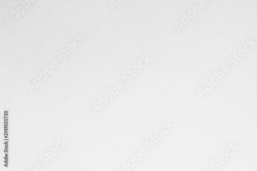 White recycled craft paper texture as background. Grey paper texture, Old vintage page or grunge vignette of old newspaper. Pattern rough art creased grunge letter. Hardboard with copy space for text.