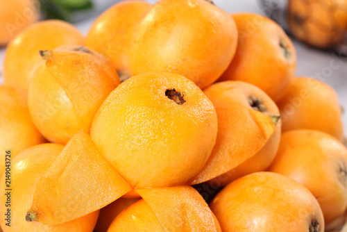 Картината върху платно Fresh Sweet Loquat Fruits from Miyi Panzhihua - Alpine Star Produce with Orange