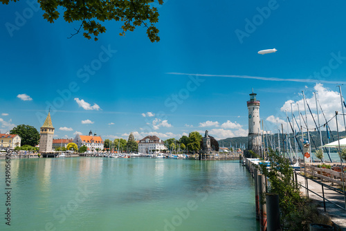 Historic Lindau harbor with lighthouse and lion statue on Lake Constance ideal for travel and tourism