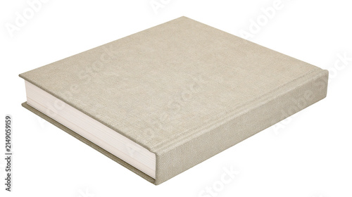 Bild auf Leinwand Hardcover book with textured beige fabric cover and white pages