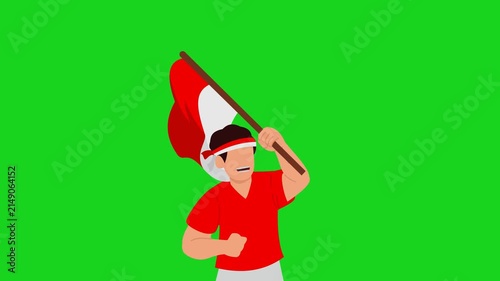 Footage of an Indonesian youth wearing a red and white headband and waving the red and white flag