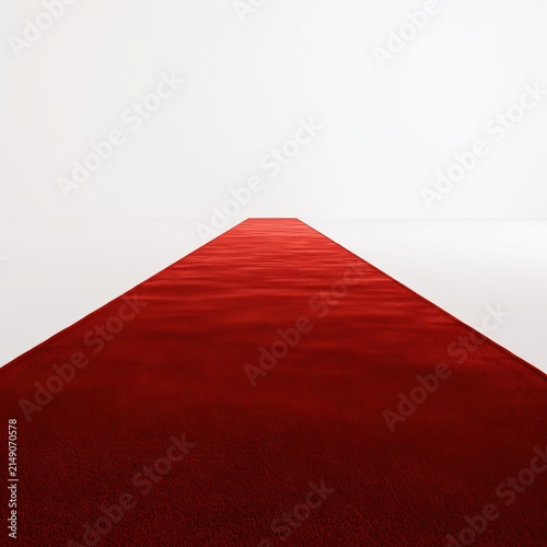 Long red carpet stretches across white space.
