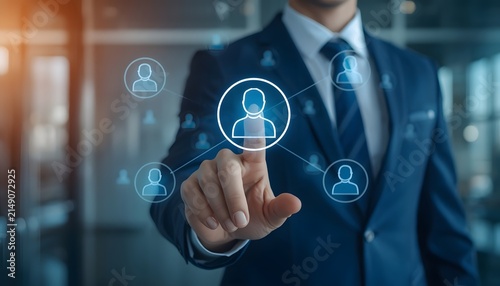Corporate professional managing digital human resource network interfaces through interactive virtual touchscreen technology for recruitment success