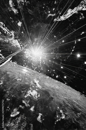 Dramatic Black and White Space Scene with Earth and Light Burst.