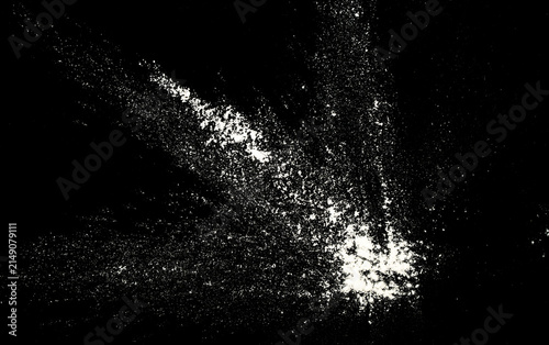 Canvastavla White Flour powder burst and scattered particles on a black background, creating