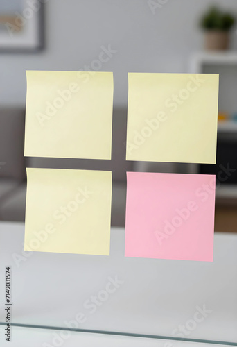 Four blank sticky notes on ...