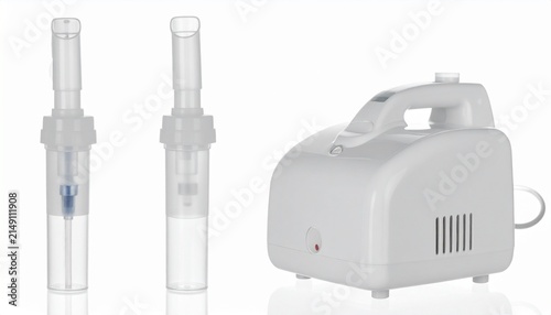Medical nebulizer machine with medication cup and mouthpiece isolated on white background