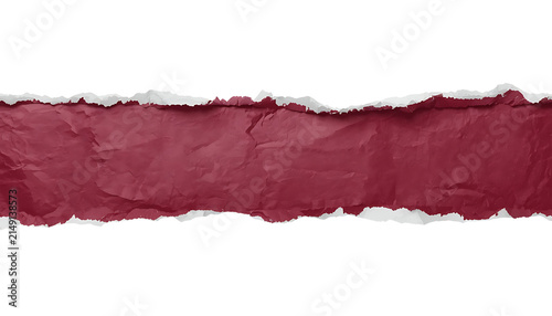 Horizontal strip of deep red crumpled paper with jagged torn edges isolated on white background with wrinkled paper showing showing textured folds