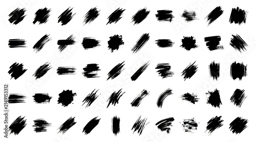 Set of black ink brush strokes and paint textures for creative design projects