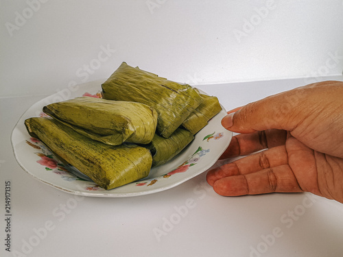 Fotografie May I take this rice cake? Authentic Indonesian cuisine.