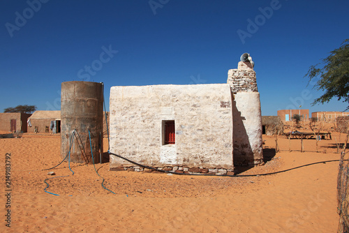 Ancient mosque in the small village in Sahara desert, Mauritania,