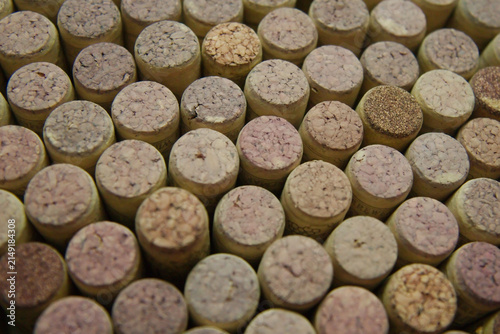 Top view of many wine corks standing upright in a group with vertical, material
