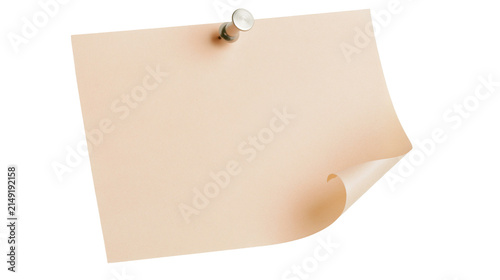 Beige paper sheet pinned with silver thumbtack