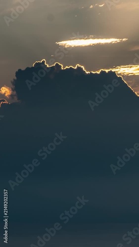 Golden Sunset Behind Dramatic Storm Clouds, Vertical Timelapse 
