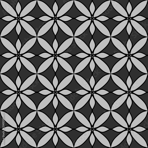 Seamless monochrome floral geometric pattern in batik style.