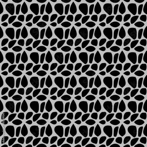Seamless abstract geometric pattern with black stone shapes on gray background.