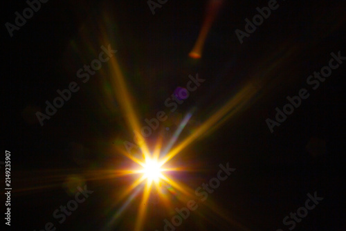 Sun flare on the black background